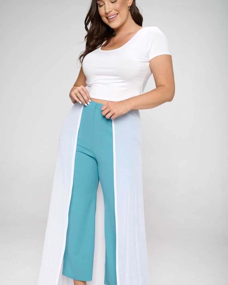 Front of a model wearing a size 1X Walk Through Mesh Pants in Seafoam and White by L I V D. | dia_product_style_image_id:240608